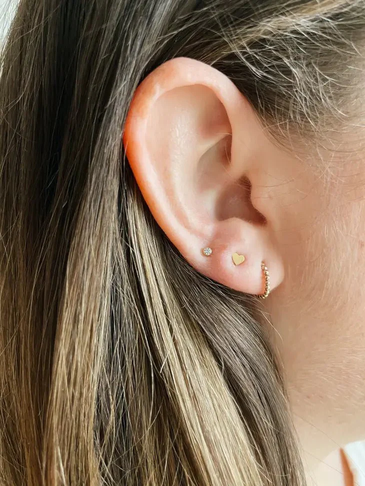 Gold Heart Stud Earrings - Image 2